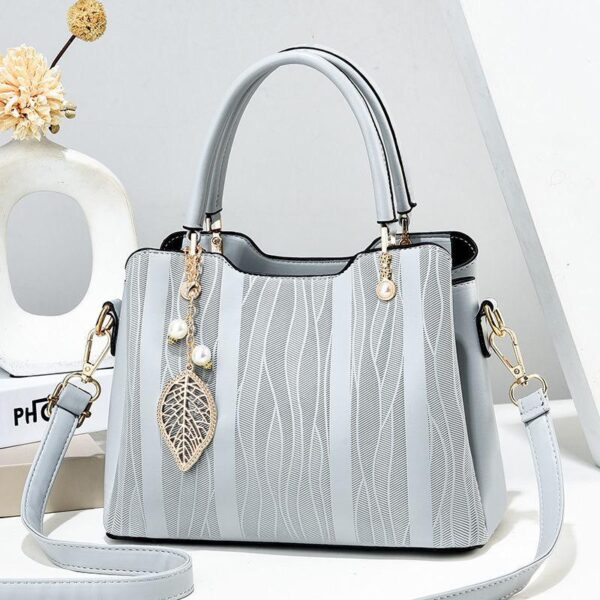 Fashion trade women wholesale vertical stripe road shoulder bag - Image 6