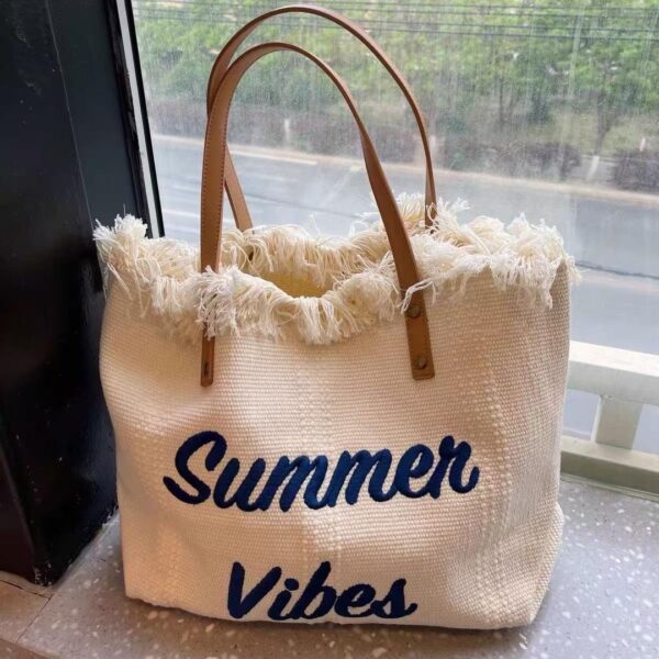 Tassel woven canvas bag women's 2024 new embroidery letter commuter tote bag fashion versatile shoulder bag trend