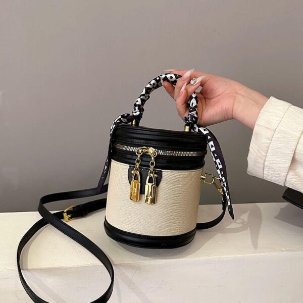 2024 new niche design hand-held cylinder bag contrasting colour bucket bag women's versatile one-shoulder cross-body bag foreign style round - Image 2