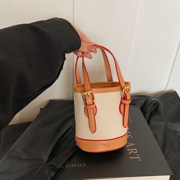 High-end colour-match bucket bag 2024 autumn and winter new versatile fashion hand-held one-shoulder Commuter cross-body bag